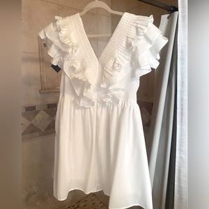 Women’s Size Large white dress never worn above knee length